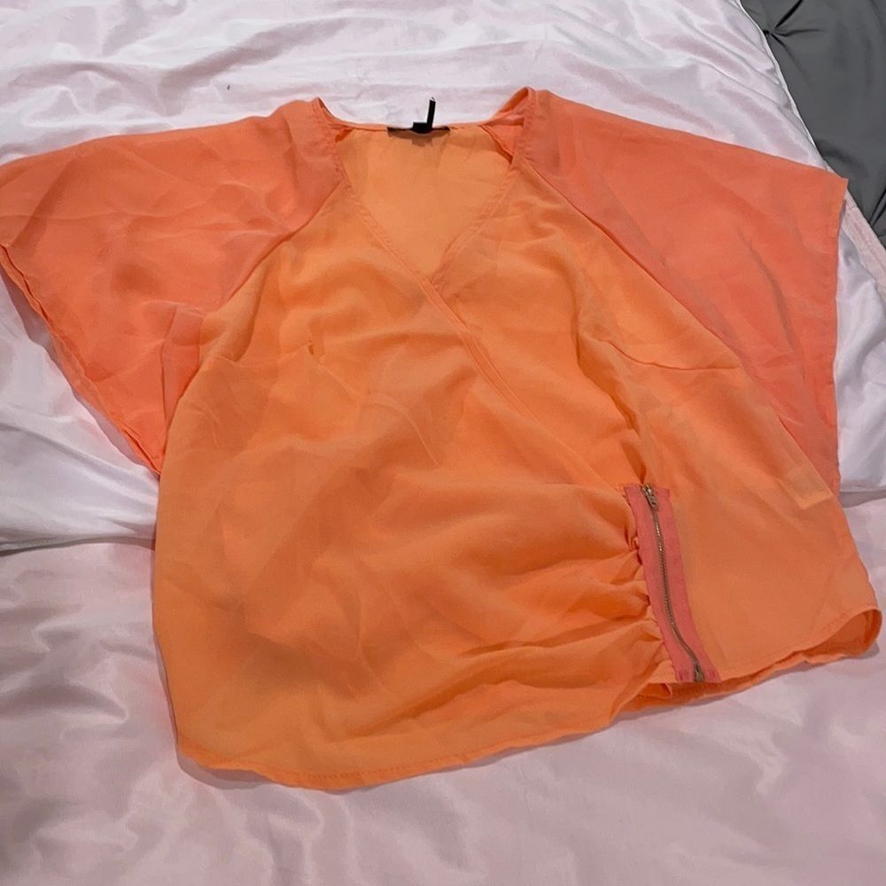 Sheer crisscross orange top
